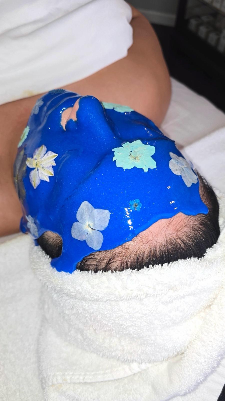 person applying jelly mask during facial skincare routine at home